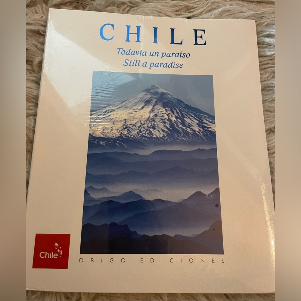 Chile paper back book; bi-lingual edition; brand new in wrap